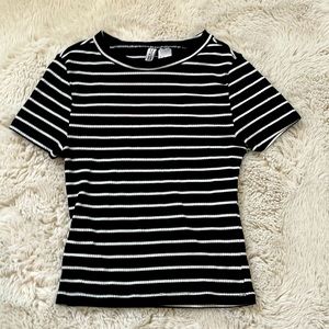 i am selling this black and white shirt from H&M. size XS.